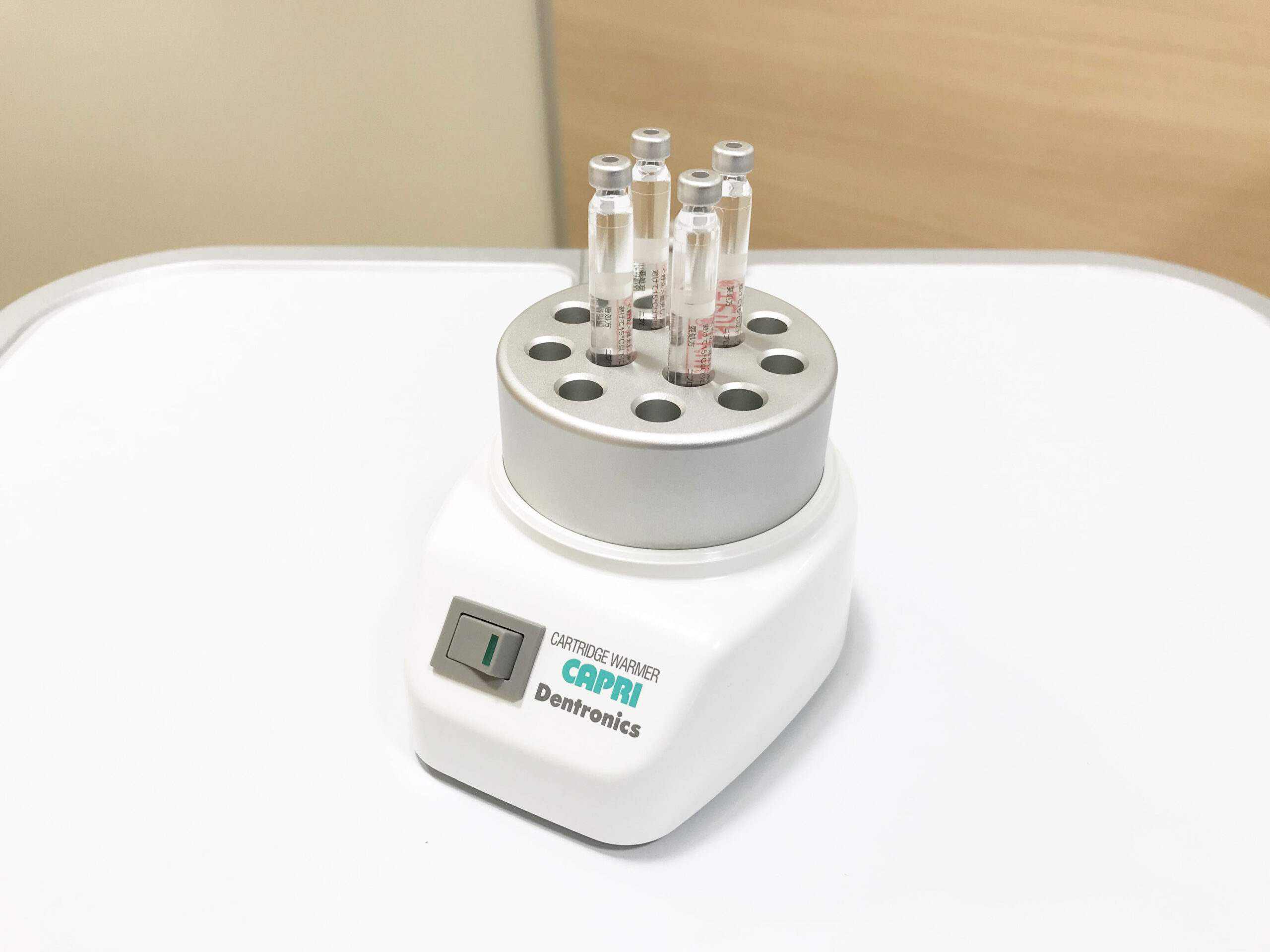 痛みに配慮した麻酔、麻酔液を体温ほどに温める｜つくば市花室のたか歯科ファミリークリニック